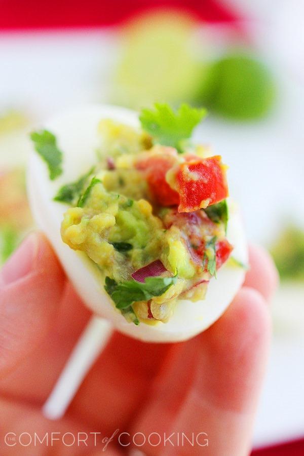Guacamole Deviled Eggs – For potlucks and parties, these delicious guacamole deviled eggs are an easy, healthy hit! | thecomfortofcooking.com