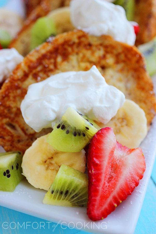 Overnight Cinnamon-Vanilla French Toast – Simple, scrumptious French toast piled with fruit that’s ready to sizzle in the skillet when you wake up! | thecomfortofcooking.com