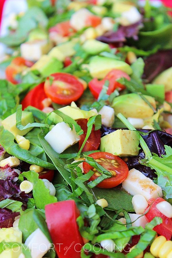 Tomato, Avocado, Corn and Basil Salad With Lemon-Balsamic Vinaigrette – Freshen up your weeknight meals with a flavoful, no-fuss salad with homemade lemon vinaigrette! | thecomfortofcooking.com