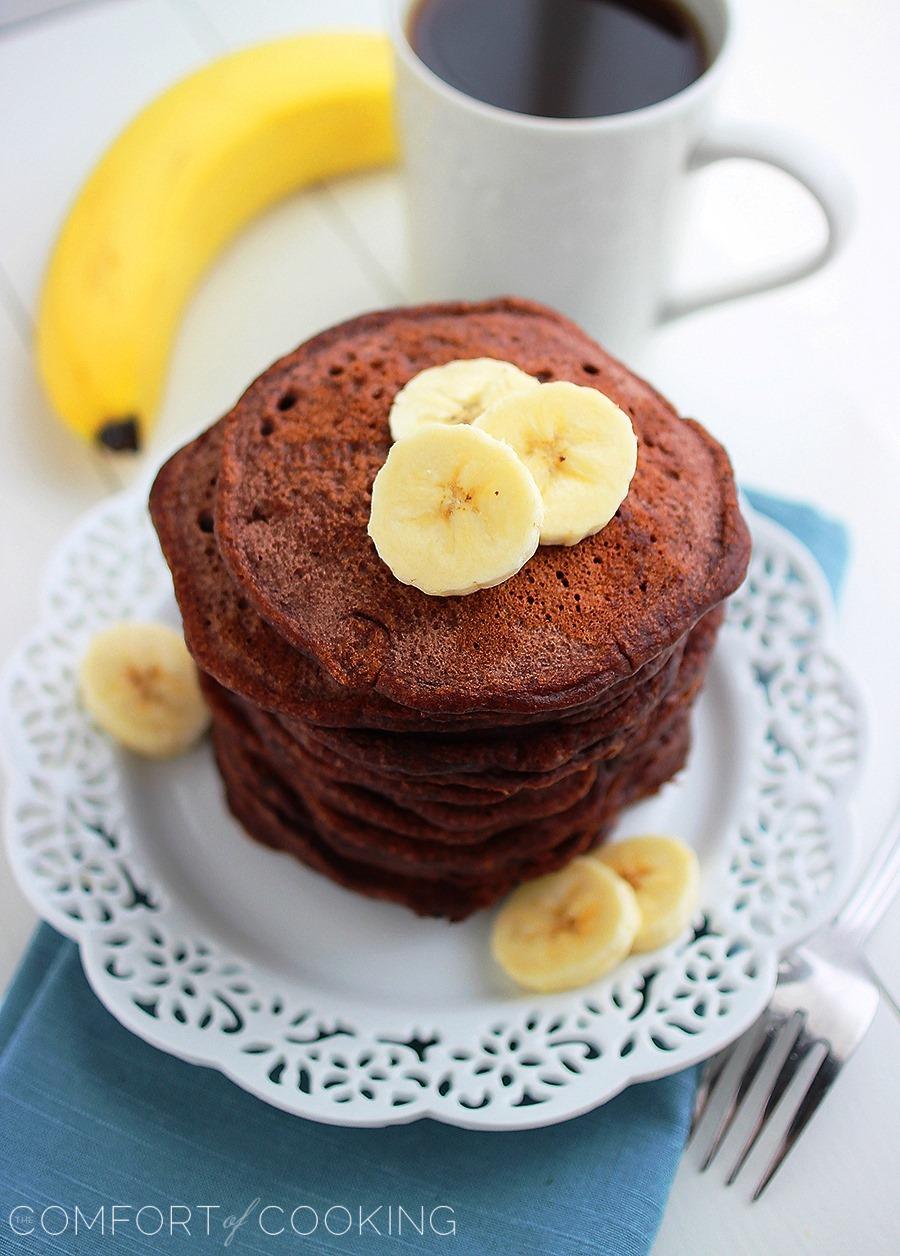 Fluffy Chocolate Banana Pancakes – Delish, easy warm chocolate banana pancakes with maple syrup... easily made AND freezable! | thecomfortofcooking.com