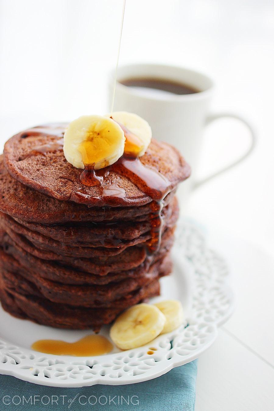 Fluffy Chocolate Banana Pancakes – Delish, easy warm chocolate banana pancakes with maple syrup... easily made AND freezable! | thecomfortofcooking.com