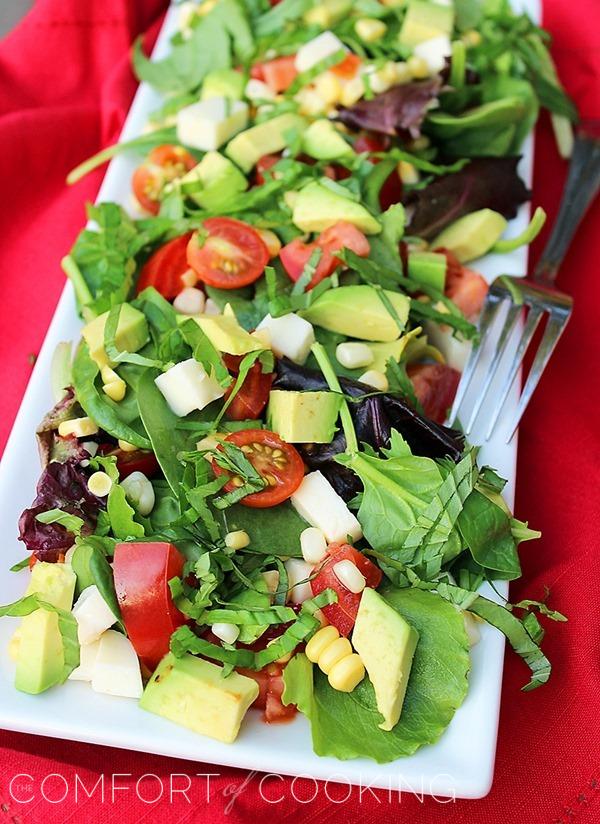 Tomato, Avocado, Corn and Basil Salad With Lemon-Balsamic Vinaigrette – Freshen up your weeknight meals with a flavoful, no-fuss salad with homemade lemon vinaigrette! | thecomfortofcooking.com