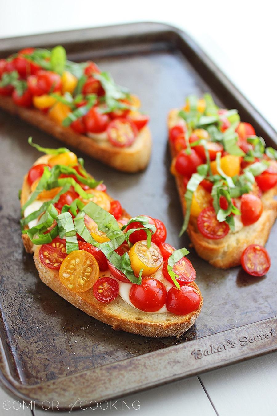 Warm Tomato & Mozzarella Bruschetta – My favorite EVER bruschetta. So gooey and delicious! The perfect party appetizer or easy vegetarian meal. | thecomfortofcooking.com