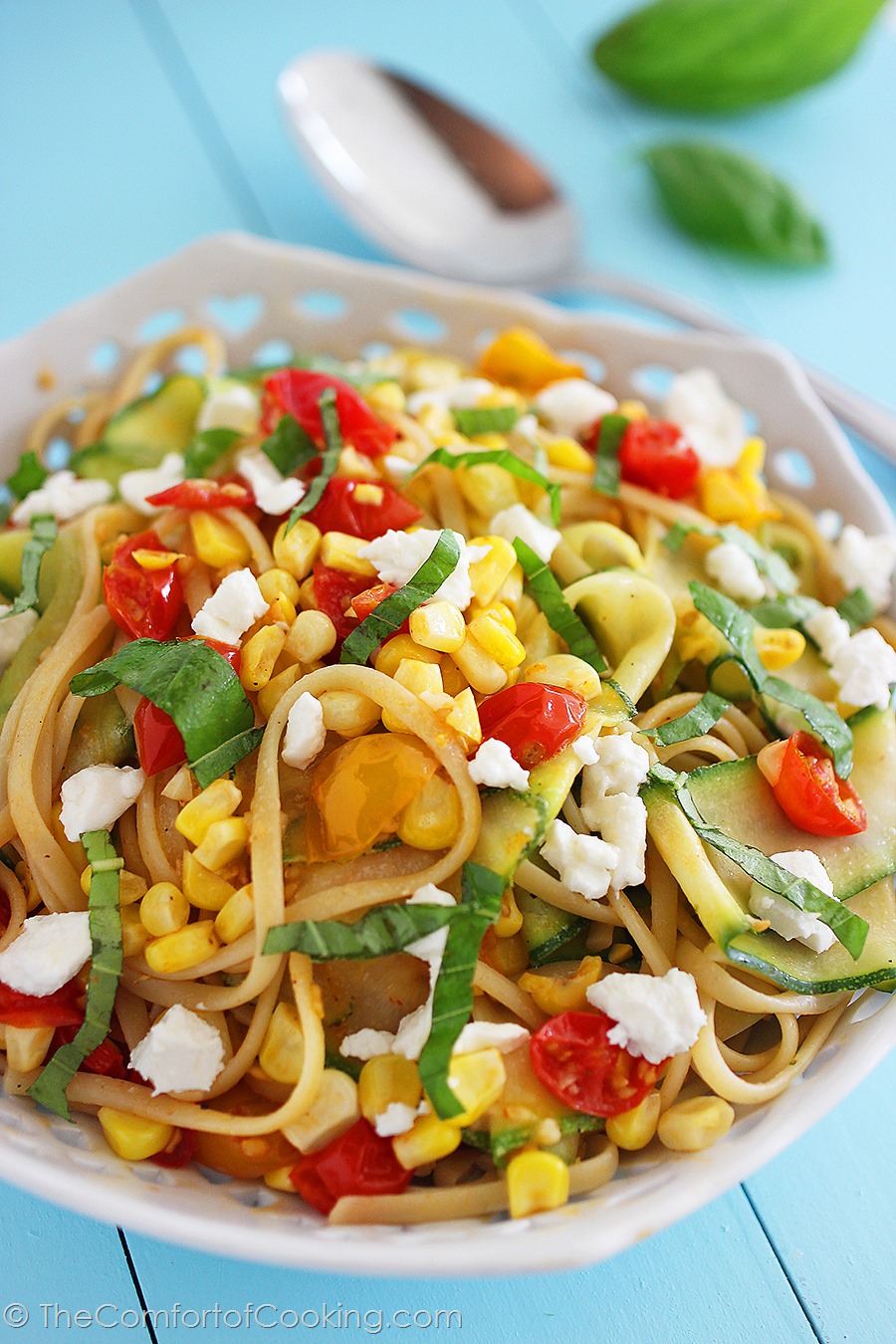 Summer Vegetable Linguine with Feta – Twirl your fork around this simple, scrumptious linguine dish full of fresh summer veggies and creamy feta! | thecomfortofcooking.com