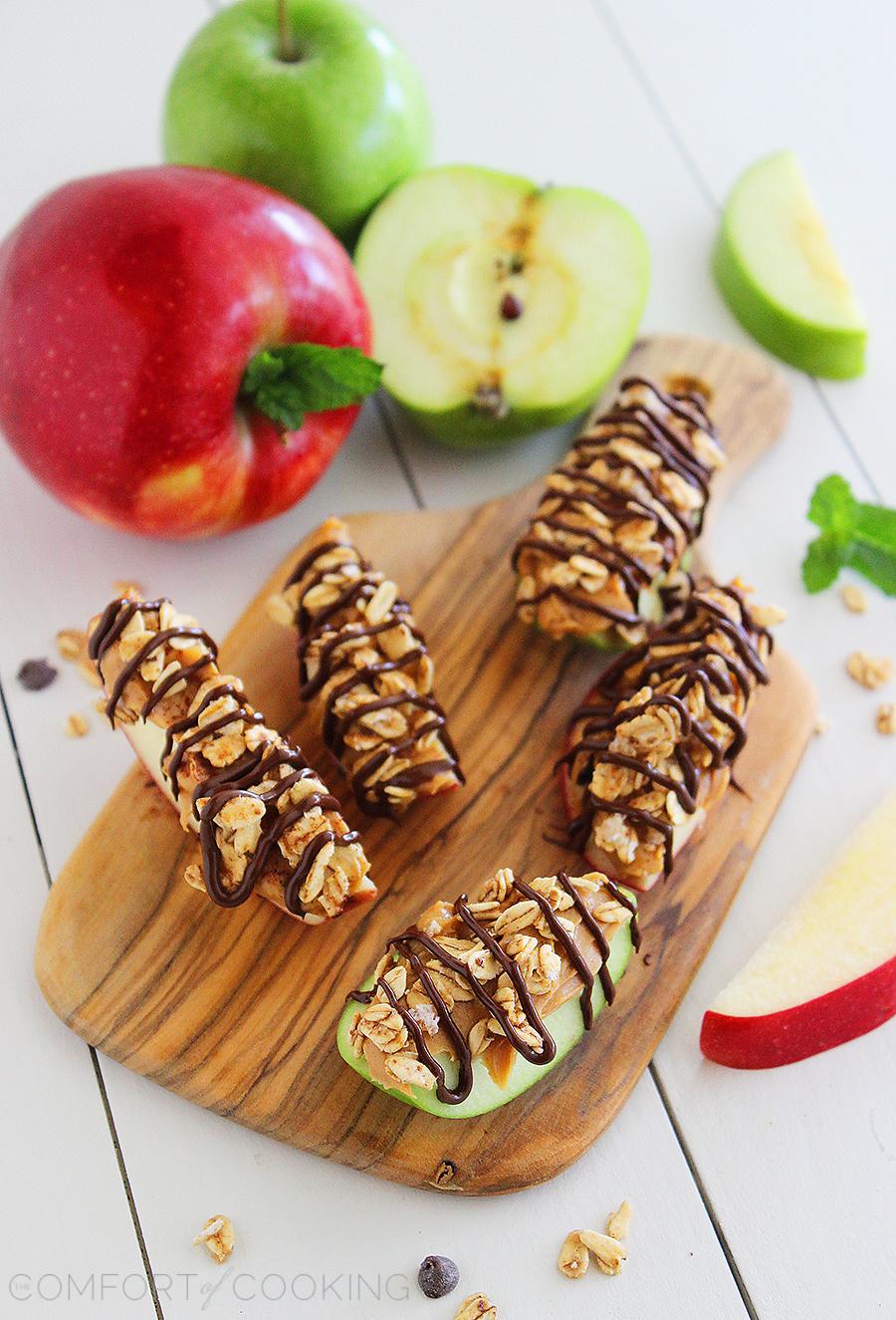 Chocolate-Peanut Butter Granola Apple Bites – Snack on these super easy, delicious and nutritious apple granola bites with a chocolate drizzle! | thecomfortofcooking.com