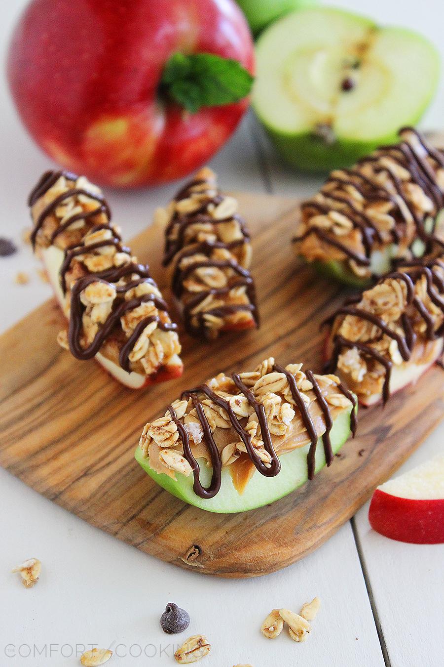 Chocolate-Peanut Butter Granola Apple Bites – Snack on these super easy, delicious and nutritious apple granola bites with a chocolate drizzle! | thecomfortofcooking.com