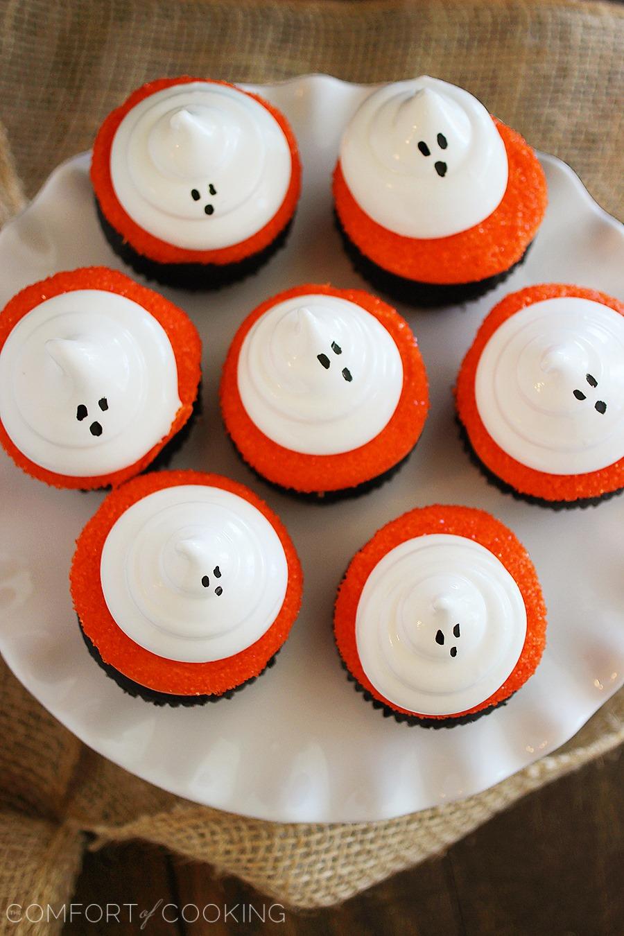 Dark Chocolate Cupcakes with Meringue Ghosts – Decadent dark chocolate cupcakes with fluffy meringue ghosts make for a scrumptious, spooky Halloween treat! | thecomfortofcooking.com