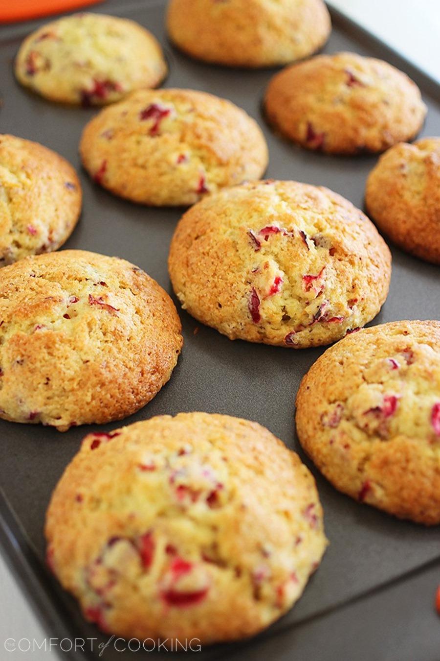 Glazed Cranberry Orange Muffins – Super soft, sweet and tart cranberry-orange muffins with an orange glaze! | thecomfortofcooking.com