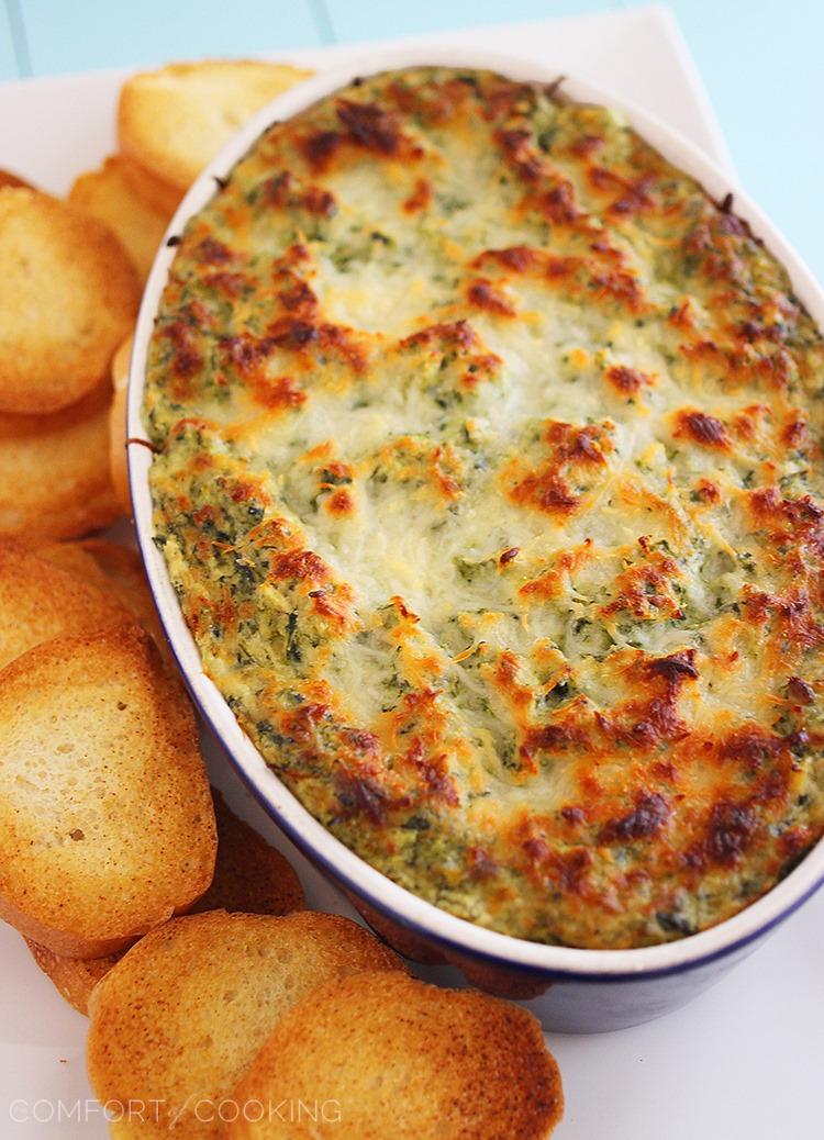 Hot Cheesy Spinach-Artichoke Dip – Super easy, cheesy dip that pairs perfectly with toasty baguettes, crackers and pretzels! | thecomfortofcooking.com