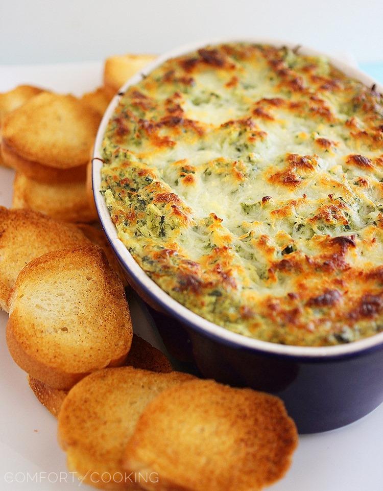 Hot Cheesy Spinach-Artichoke Dip – Super easy, cheesy dip that pairs perfectly with toasty baguettes, crackers and pretzels! | thecomfortofcooking.com