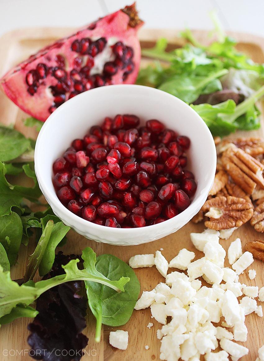 Mixed Green Salad with Pomegranate Seeds, Feta and Pecans – Perfect for a light and colorful holiday side dish! | thecomfortofcooking.com