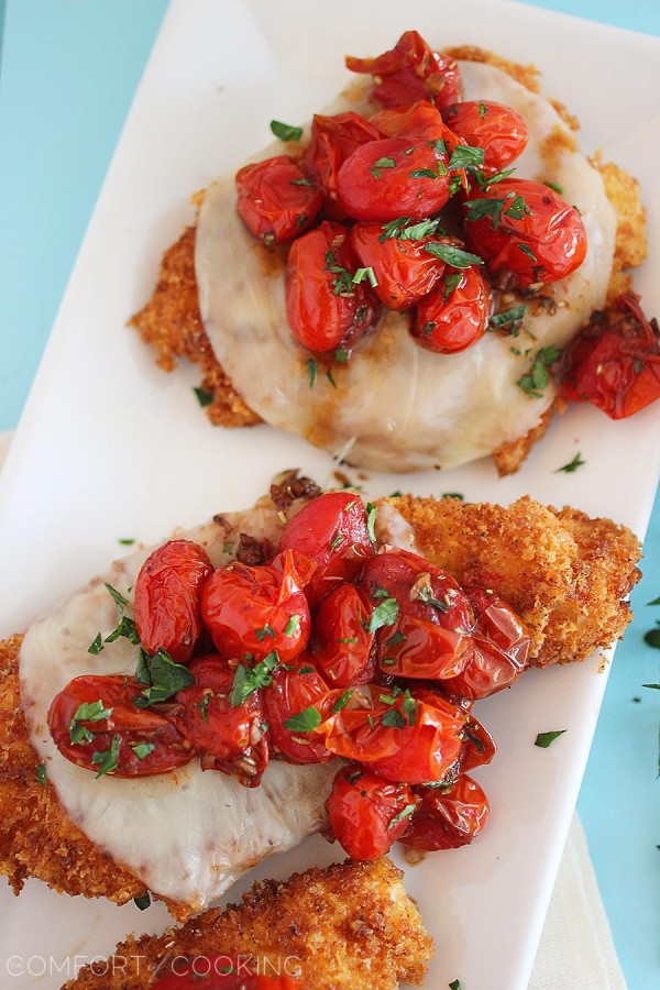 Crispy Parmesan Chicken with Balsamic Roasted Tomatoes – Crispy cutlets topped with sweet, juicy balsamic tomatoes is one of our favorite easy weeknight meals! | thecomfortofcooking.com