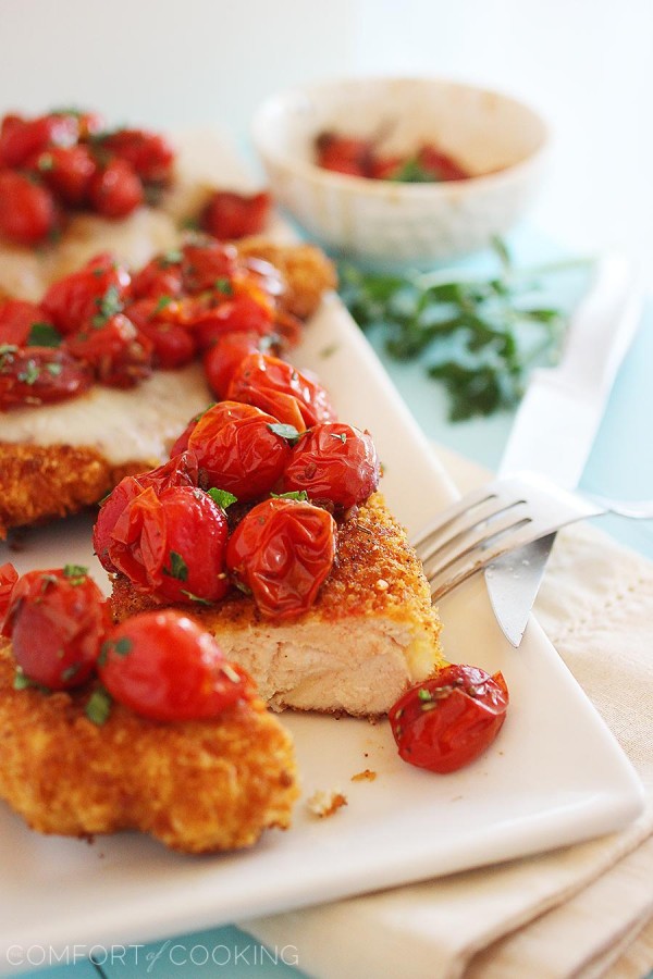 Crispy Parmesan Chicken with Balsamic Roasted Tomatoes – Crispy cutlets topped with sweet, juicy balsamic tomatoes is one of our favorite easy weeknight meals! | thecomfortofcooking.com