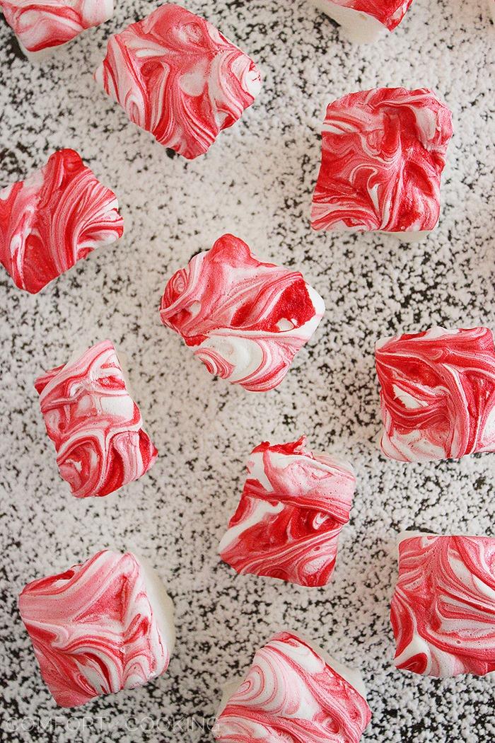 Peppermint Candy Cane Marshmallows – Fluffy marshmallows made from scratch, with a peppermint swirl. Easy for homemade gifts, and incredible in cups of hot cocoa! | thecomfortofcooking.com