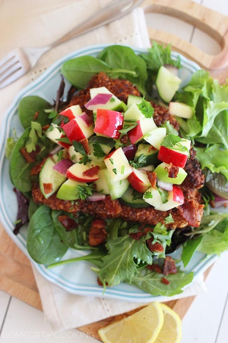 Crispy Chicken Salad with Apples and Bacon – Crispy chicken with a fresh, crunchy apple-cucumber salsa and bacon tops mixed greens. Makes for a mouthwatering weeknight meal! | thecomfortofcooking.com