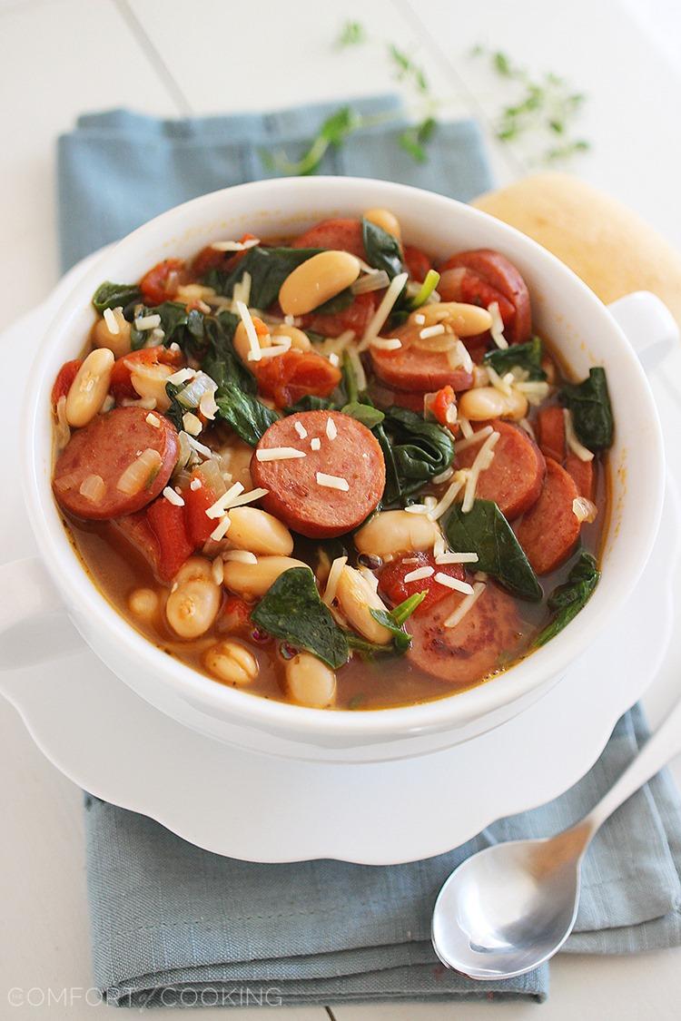 Smoked Sausage, Spinach and White Bean Soup – Hearty, healthy and full of flavor, this soup is our new favorite weeknight meal. You won't believe how simple it is, too! | thecomfortofcooking.com