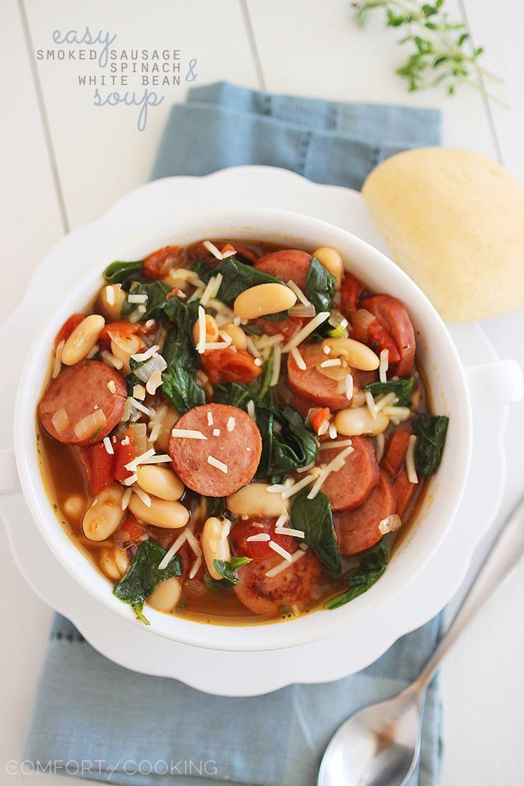 Smoked Sausage, Spinach and White Bean Soup – Hearty, healthy and full of flavor, this soup is our new favorite weeknight meal. You won't believe how simple it is, too! | thecomfortofcooking.com