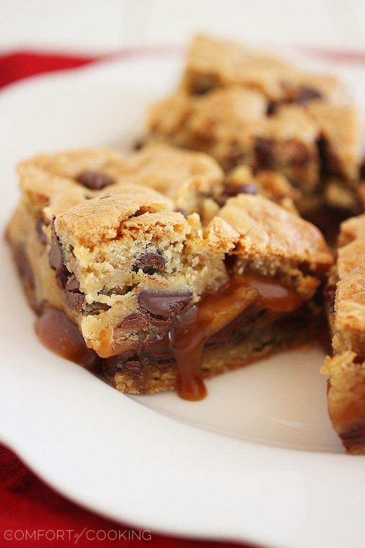 Salted Caramel Chocolate Chunk Cookie Bars – These soft and chewy Salted Caramel Cookie Bars are made from scratch & irresistible dunked in a tall glass of milk! | thecomfortofcooking.com