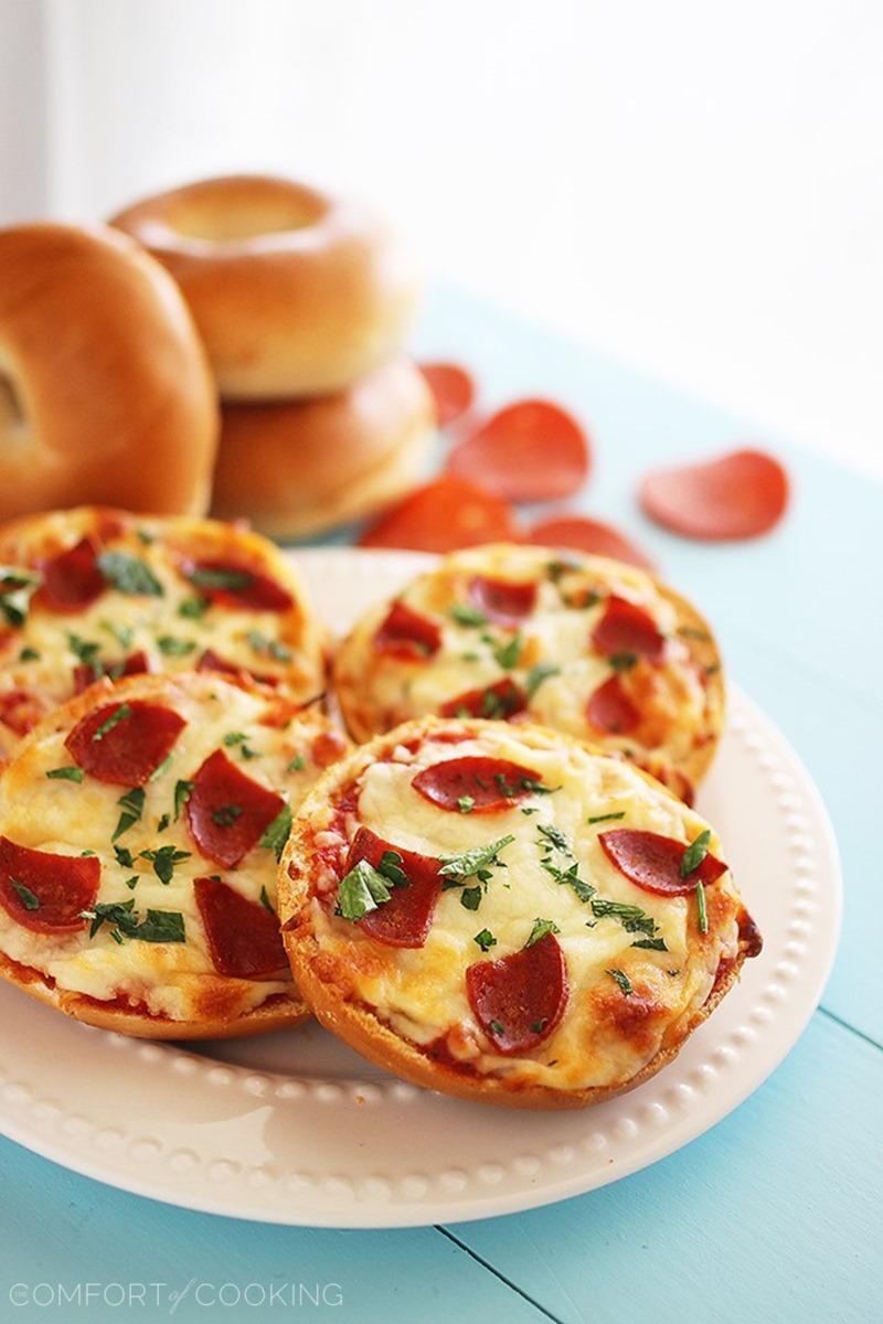 Easy Mini Bagel Pizzas – Crispy, cheesy pizzas on top of mini bagels, piled with your favorite toppings and baked to golden brown perfection. So fun for parties! | thecomfortofcooking.com