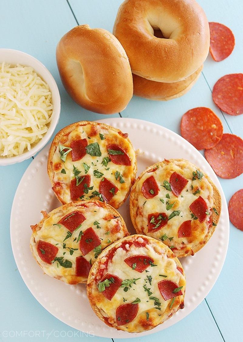 Easy Mini Bagel Pizzas – Crispy, cheesy pizzas on top of mini bagels, piled with your favorite toppings and baked to golden brown perfection. So fun for parties! | thecomfortofcooking.com