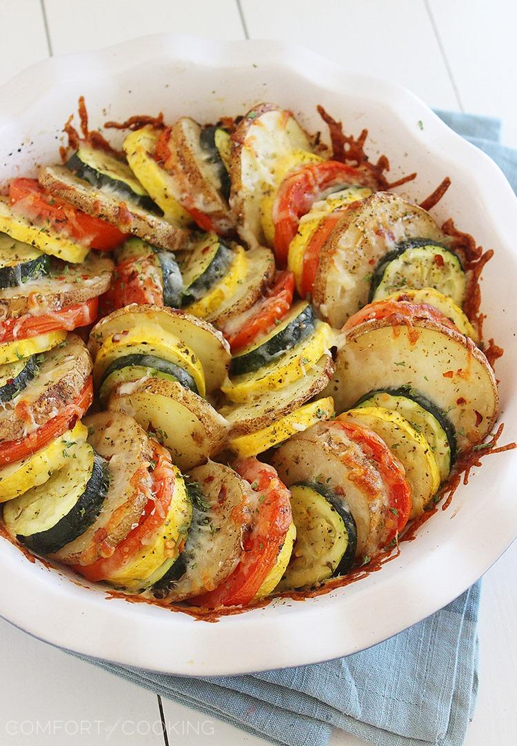 Parmesan Vegetable Tian – Our all-time favorite side dish! Layered potatoes, zucchini, tomatoes and squash, baked 'til tender & crisp with a cheesy Parmesan topping. Healthy, colorful and delicious on the side of roasted meats! | thecomfortofcooking.com