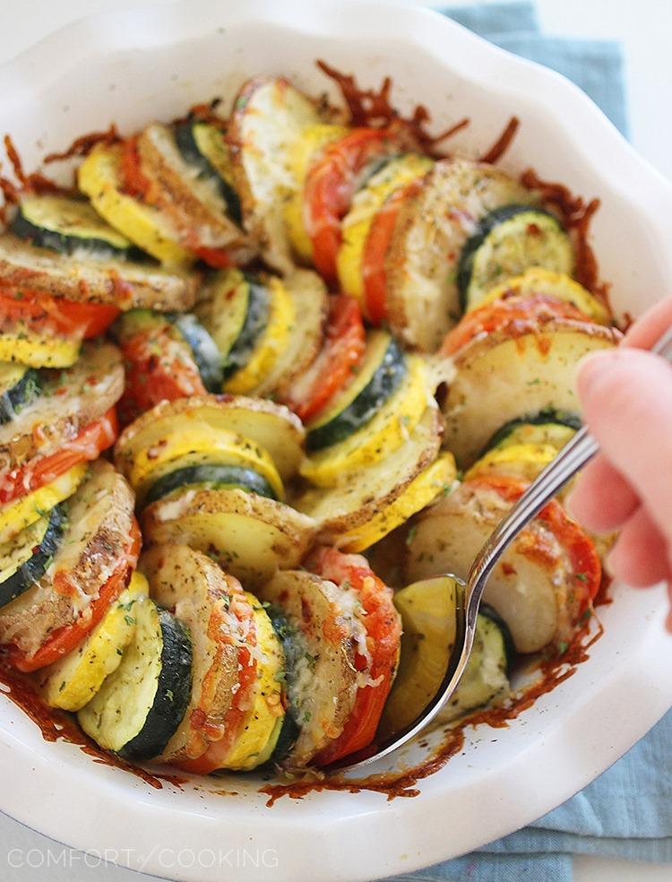 Parmesan Vegetable Tian – Our all-time favorite side dish! Layered potatoes, zucchini, tomatoes and squash, baked 'til tender & crisp with a cheesy Parmesan topping. Healthy, colorful and delicious on the side of roasted meats! | thecomfortofcooking.com