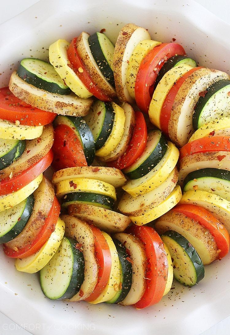 Parmesan Vegetable Tian – Our all-time favorite side dish! Layered potatoes, zucchini, tomatoes and squash, baked 'til tender & crisp with a cheesy Parmesan topping. Healthy, colorful and delicious on the side of roasted meats! | thecomfortofcooking.com