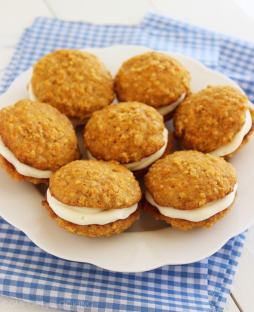 Soft Carrot Cake Sandwich Cookies – Soft, cinnamon-spiced carrot cake cookies with an easy cream cheese frosting. Hard to resist for carrot cake lovers! | thecomfortofcooking.com