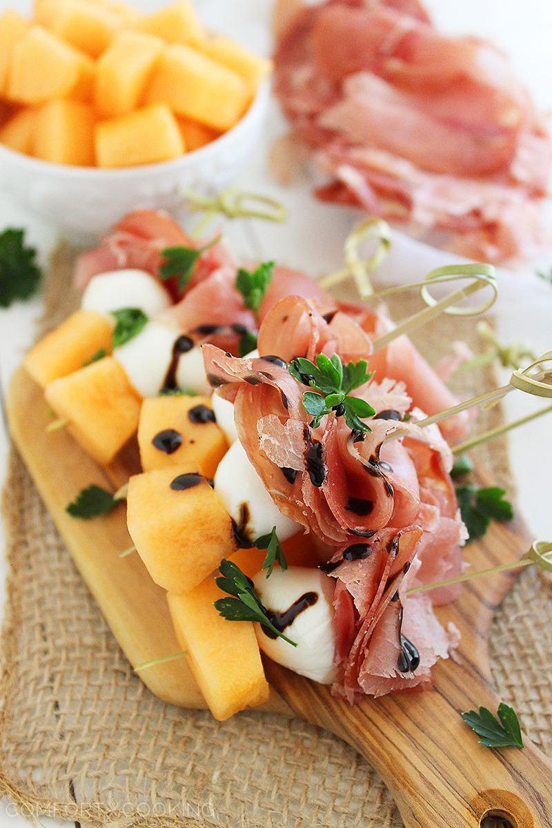 Melon, Proscuitto and Mozzarella Skewers – These sweet and salty skewers with prosciutto, melon and creamy mozzarella are easy bites for any party! | thecomfortofcooking.com