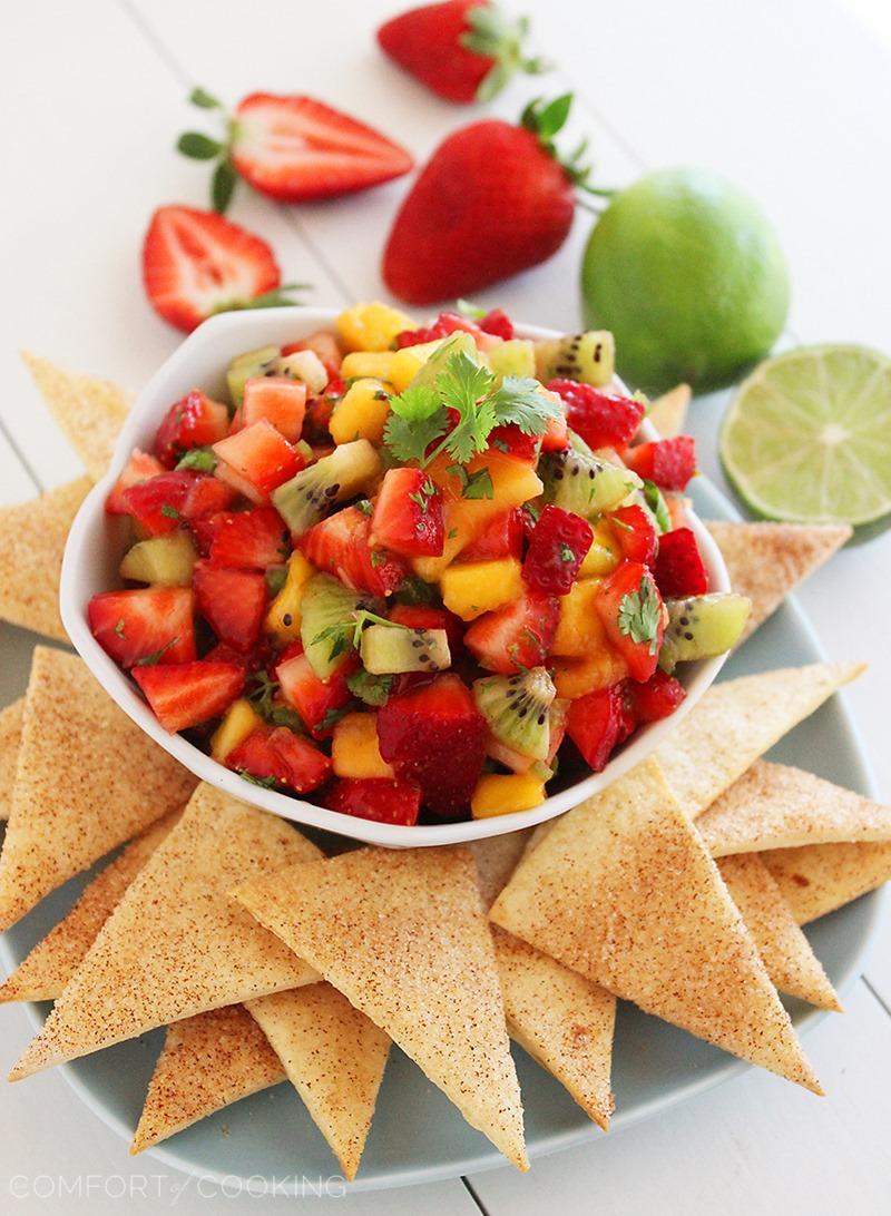 Strawberry Mango Salsa with Cinnamon-Sugar Tortilla Chips – Juicy, sweet and colorful fruit salsa paired with cinnamon sugar tortilla chips makes the perfect party snack! | thecomfortofcooking.com
