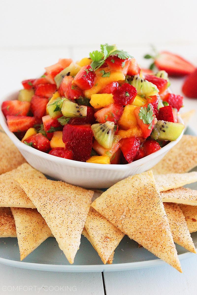 Strawberry Mango Salsa with Cinnamon-Sugar Tortilla Chips – Juicy, sweet and colorful fruit salsa paired with cinnamon sugar tortilla chips makes the perfect party snack! | thecomfortofcooking.com