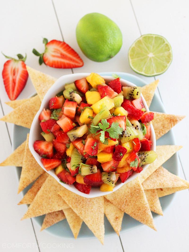 Strawberry Mango Salsa with Cinnamon-Sugar Tortilla Chips – Juicy, sweet and colorful fruit salsa paired with cinnamon sugar tortilla chips makes the perfect party snack! | thecomfortofcooking.com