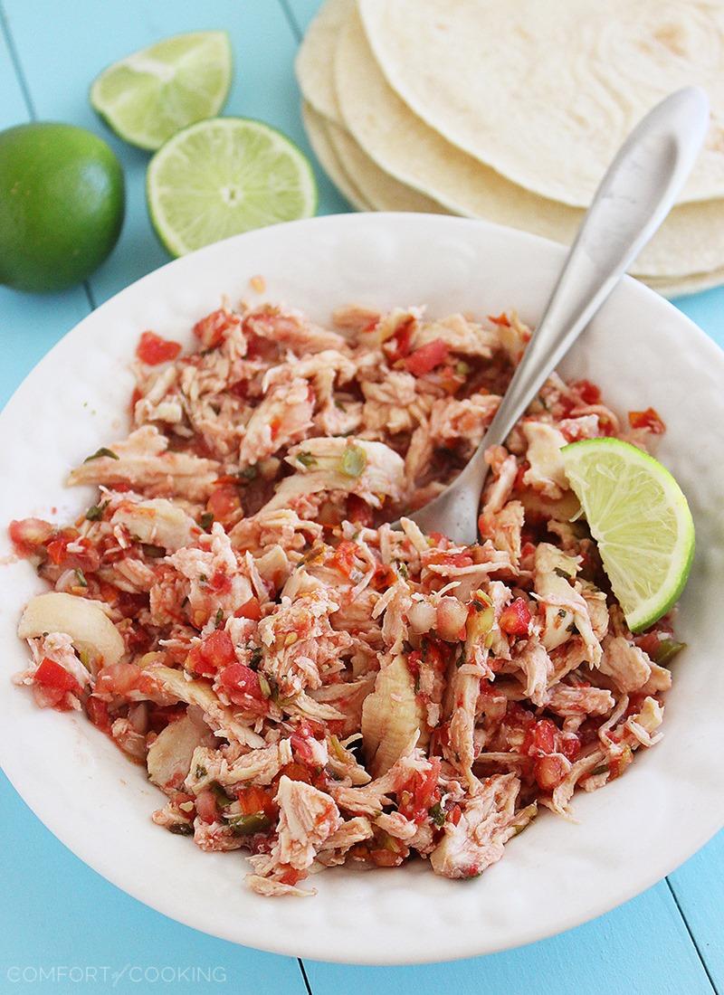 2-Ingredient Slow Cooker Salsa Chicken – This zesty, easy slow-cooked chicken tastes great in tacos, burritos, salads, sandwiches and many more Mexican dishes. Add your favorite toppings! | thecomfortofcooking.com