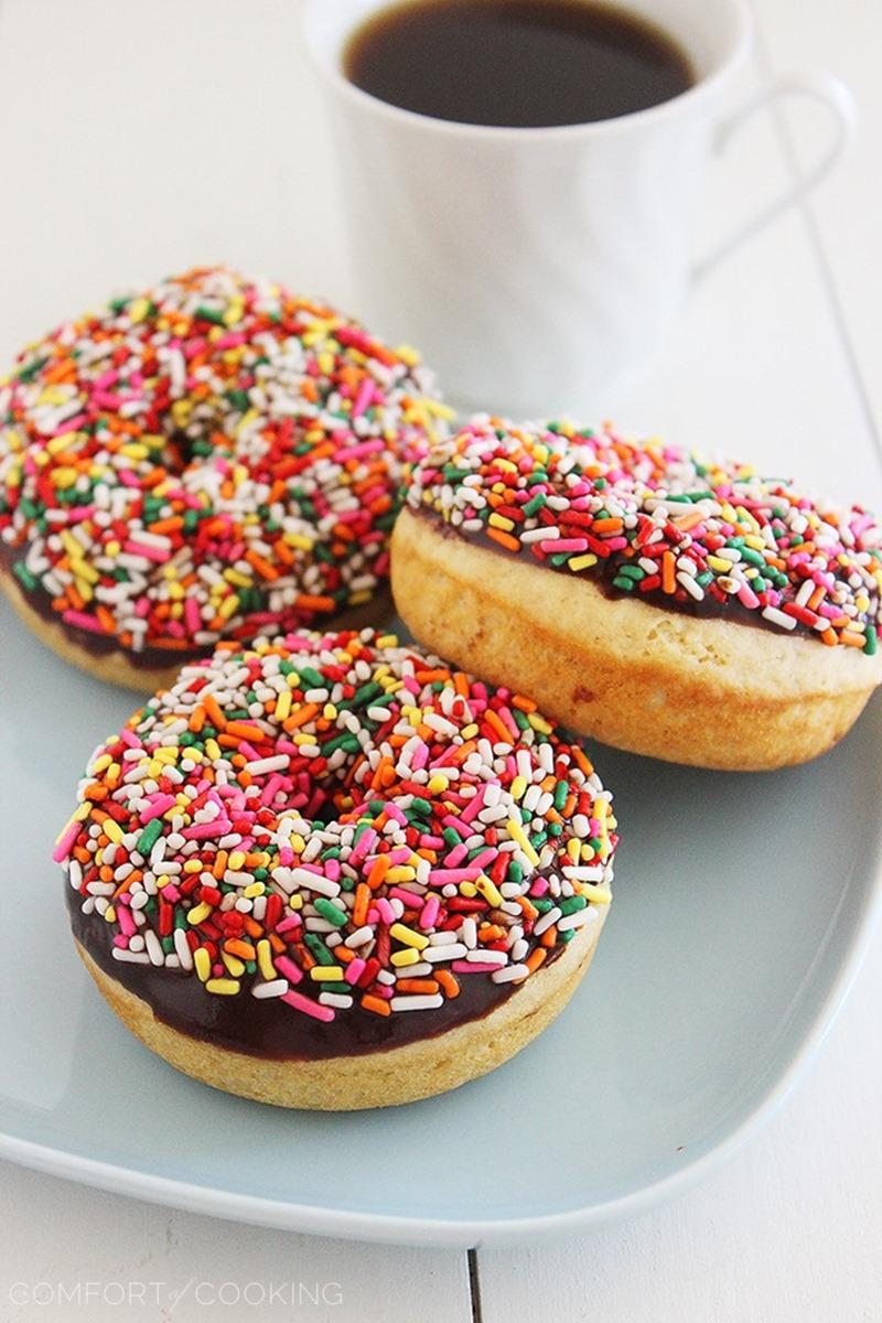 Fluffy Chocolate Frosted Donuts – These soft donuts are baked and not fried, but still taste extra indulgent for breakfast! Perfect with a cup of hot coffee. | thecomfortofcooking.com