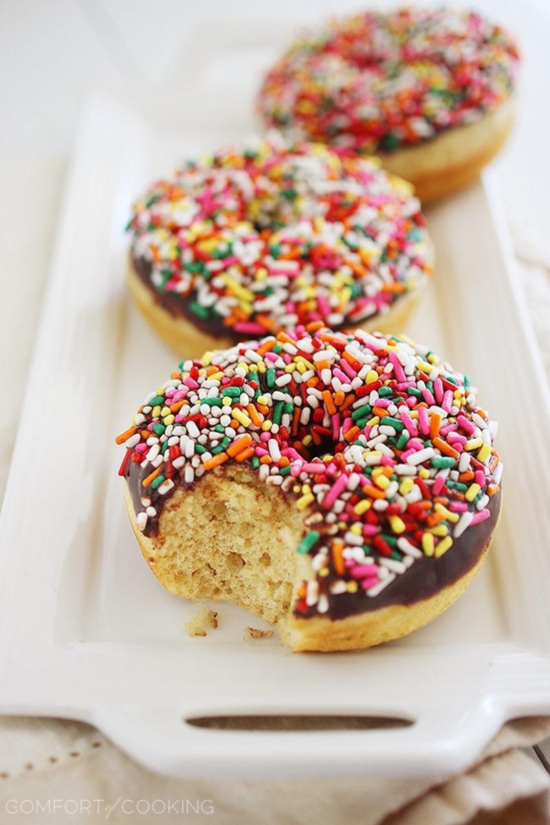 Fluffy Chocolate Frosted Donuts – These soft donuts are baked and not fried, but still taste extra indulgent for breakfast! Perfect with a cup of hot coffee. | thecomfortofcooking.com