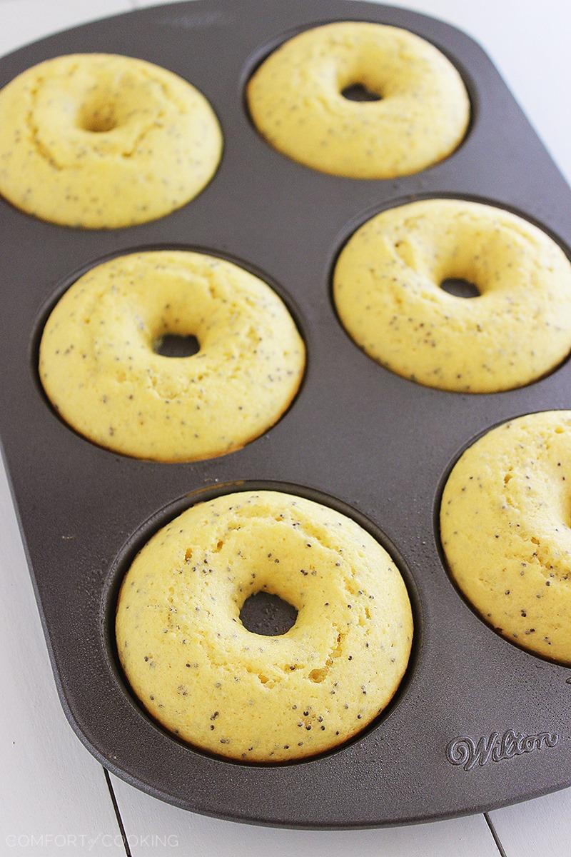 Lemon Poppy Seed Donuts with Vanilla Glaze – Bake a batch of these sunny, super soft lemon poppy seed donuts to brighten up your weekend! | thecomfortofcooking.com