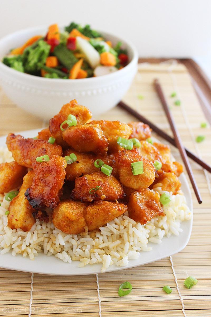Sweet 'n Spicy Firecracker Chicken – Crispy, sticky and spicy chicken served over rice (or tossed with mixed Asian veggies) makes for a colorful and delish weeknight meal. | thecomfortofcooking.com