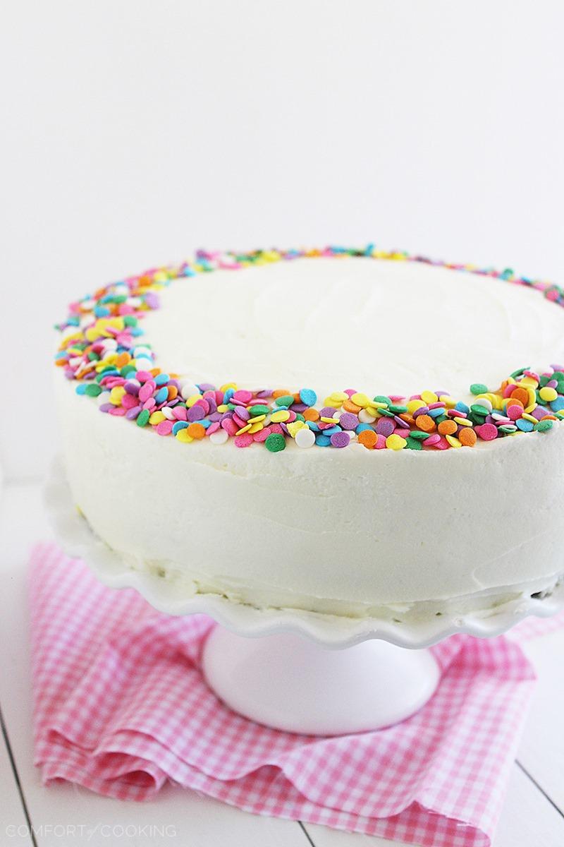 Yellow Birthday Cake with Vanilla Frosting – Hands down the best cake I've ever baked and eaten. You have to bake it to believe it! | thecomfortofcooking.com