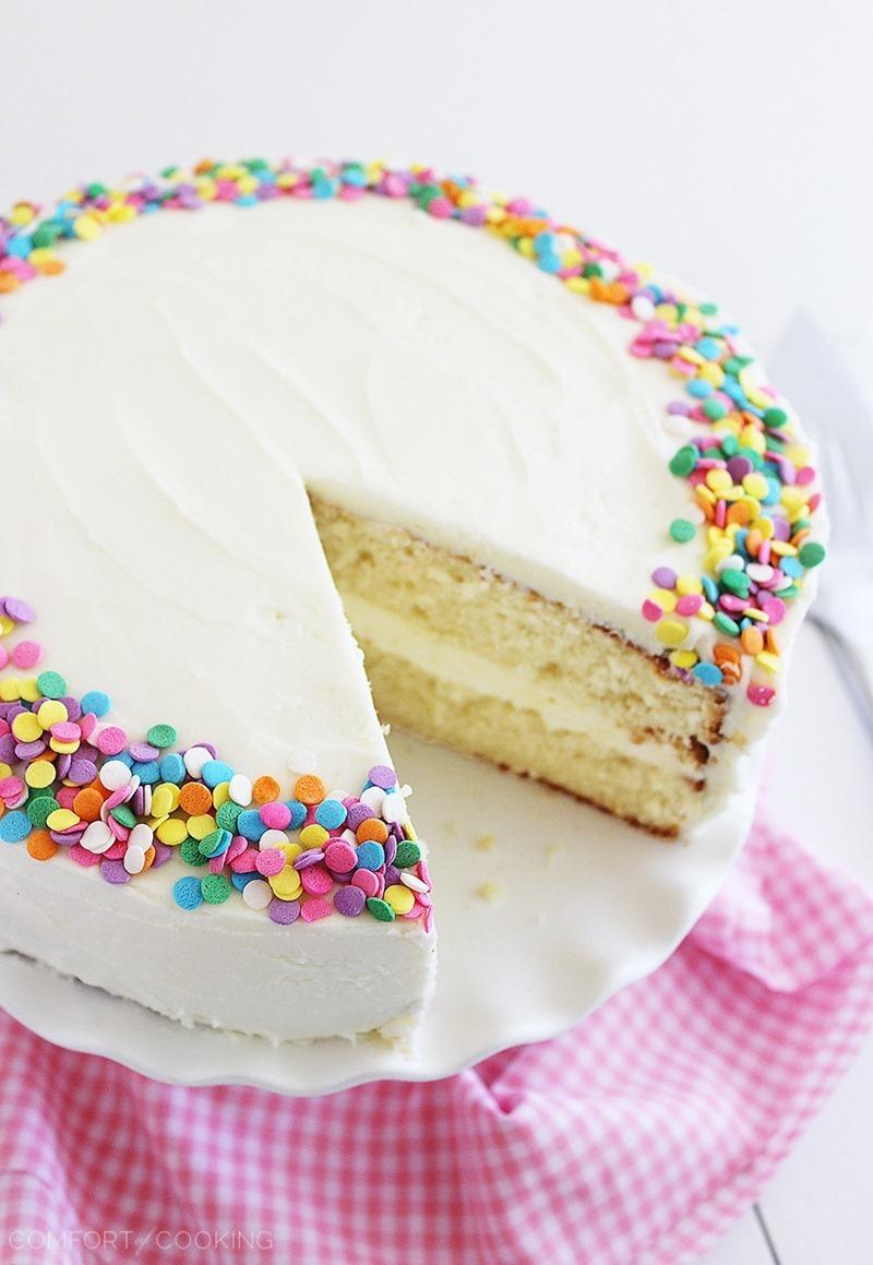 Yellow Birthday Cake with Vanilla Frosting – Hands down the best cake I've ever baked and eaten. You have to bake it to believe it! | thecomfortofcooking.com