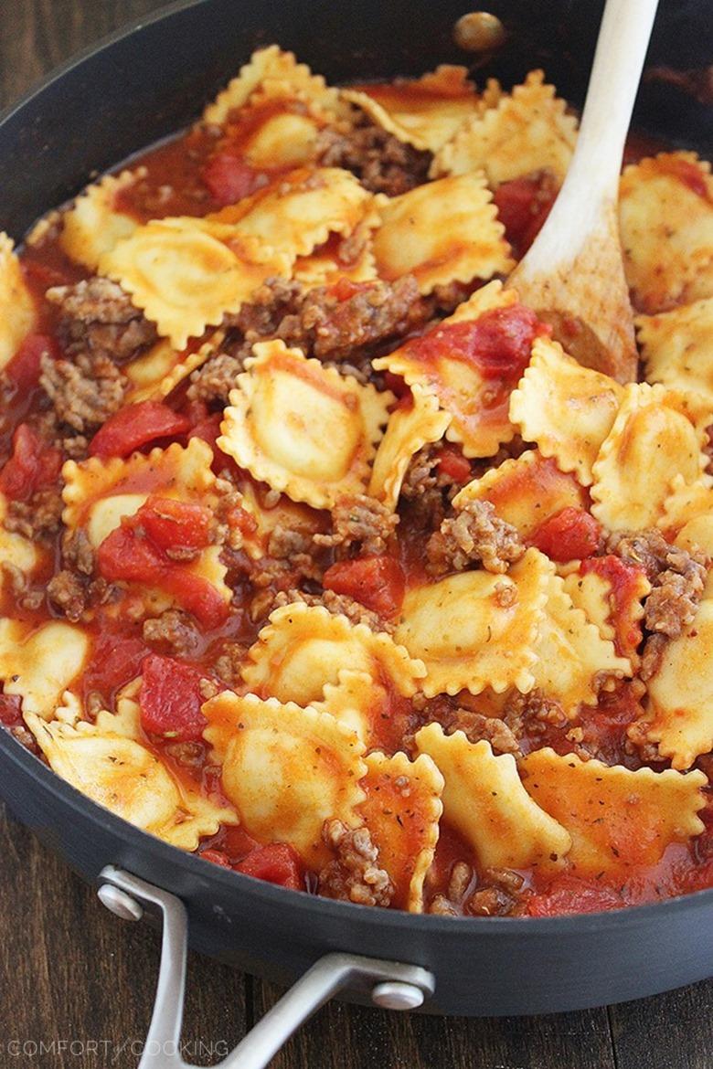 Cheesy Ravioli and Italian Sausage Skillet – This cheesy, saucy ravioli skillet with Italian sausage makes for one scrumptious weeknight meal! | thecomfortofcooking.com