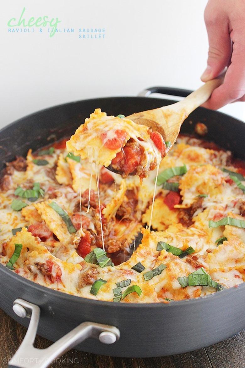 Cheesy Ravioli and Italian Sausage Skillet – This cheesy, saucy ravioli skillet with Italian sausage makes for one scrumptious weeknight meal! | thecomfortofcooking.com