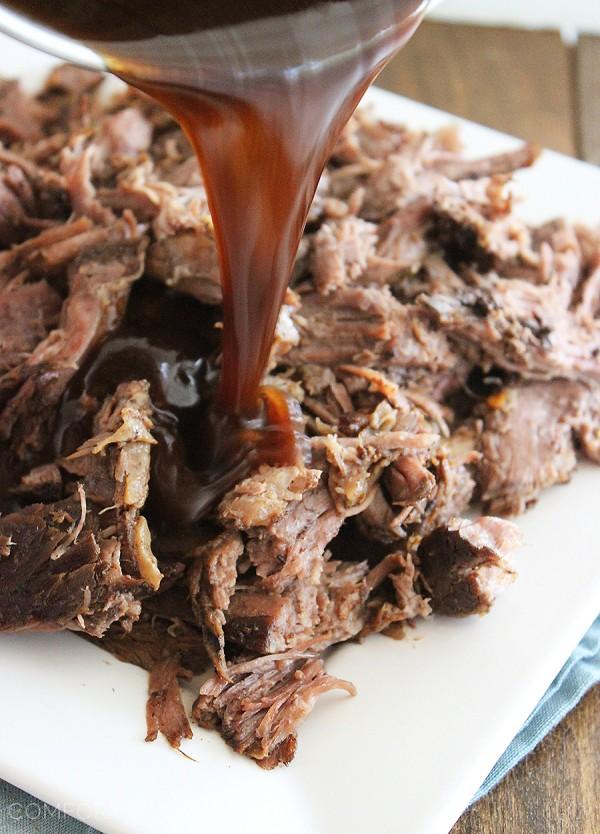 Slow Cooker Balsamic Glazed Roast Beef – This tangy, sweet and salty beef roast makes for one mouthwatering meal on a bun, or served on top of fluffy mashed potatoes! | thecomfortofcooking.com