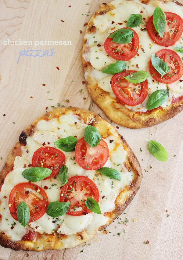 Cheesy Chicken Parmesan Flatbread Pizza – These cheesy, crisp chicken, mozzarella and tomato pizzas are so easy! Serve with a green salad for a healthy dinner. | thecomfortofcooking.com