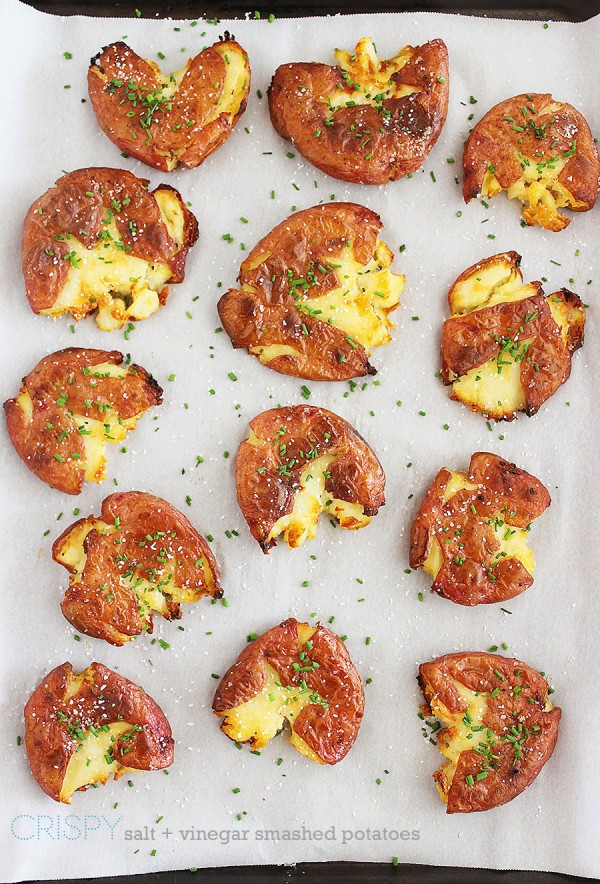 Crispy Salt and Vinegar Smashed Potatoes – Serve these super crispy, tangy potatoes on the side of your favorite grilled meats for a scrumptious meal! | thecomfortofcooking.com