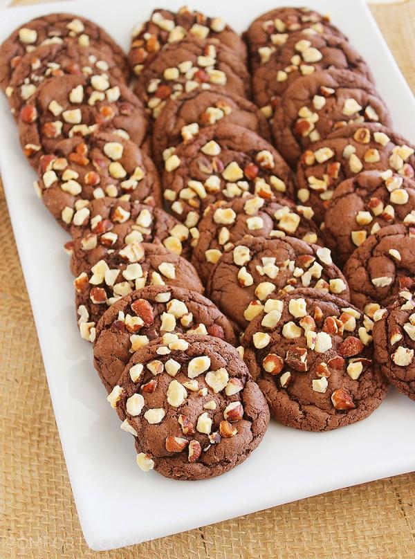 Easy Chocolate Caramel-Stuffed Cookies – These soft, chewy chocolate cookies with a gooey caramel center are made with a cake mix! | thecomfortofcooking.com