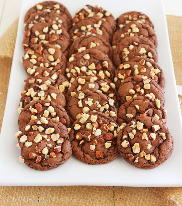 Easy Chocolate Caramel-Stuffed Cookies – These soft, chewy chocolate cookies with a gooey caramel center are made with a cake mix! | thecomfortofcooking.com