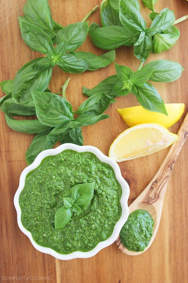 Spinach Basil Pesto – This easy, nut-free pesto pairs perfectly with grilled meats and veggies, sandwiches, and pastas! | thecomfortofcooking.com