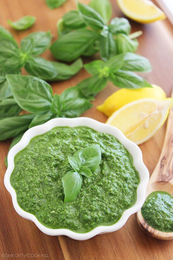 Spinach Basil Pesto – This easy, nut-free pesto pairs perfectly with grilled meats and veggies, sandwiches, and pastas! | thecomfortofcooking.com