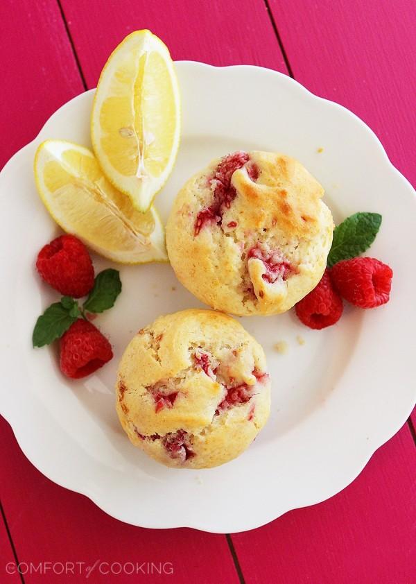 Super Soft Lemon-Raspberry Muffins – Wake up to a batch of these super soft, summery lemon raspberry muffins. They freeze and reheat easily, too! | thecomfortofcooking.com