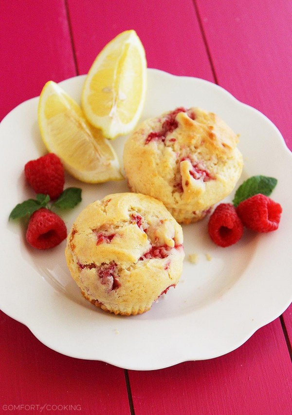 Super Soft Lemon-Raspberry Muffins – Wake up to a batch of these super soft, summery lemon raspberry muffins. They freeze and reheat easily, too! | thecomfortofcooking.com